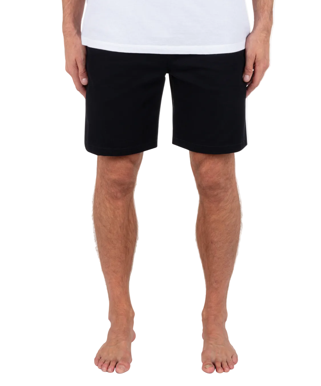 Person wearing black shorts and a white shirt on a white background