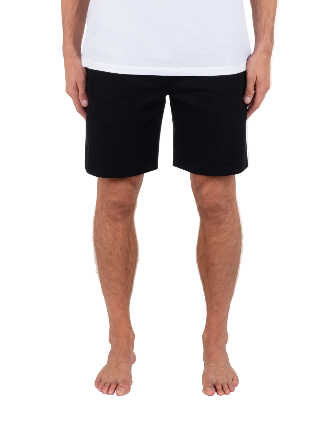 Person wearing black shorts and a white shirt on a white background