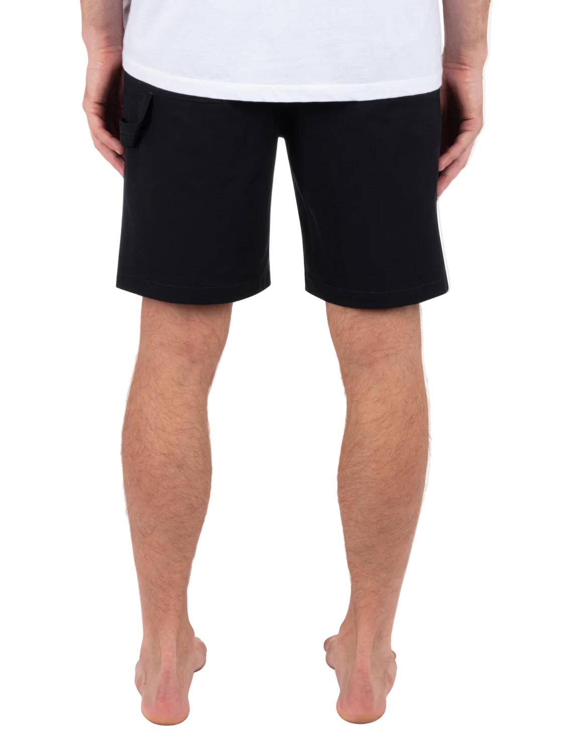 Person wearing black shorts on a white background
