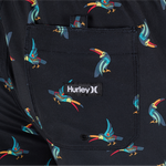 Close-up of a Hurley logo on a black background with colorful bird pattern