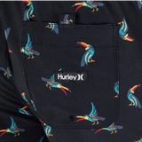 Close-up of a Hurley logo on a black background with colorful bird pattern