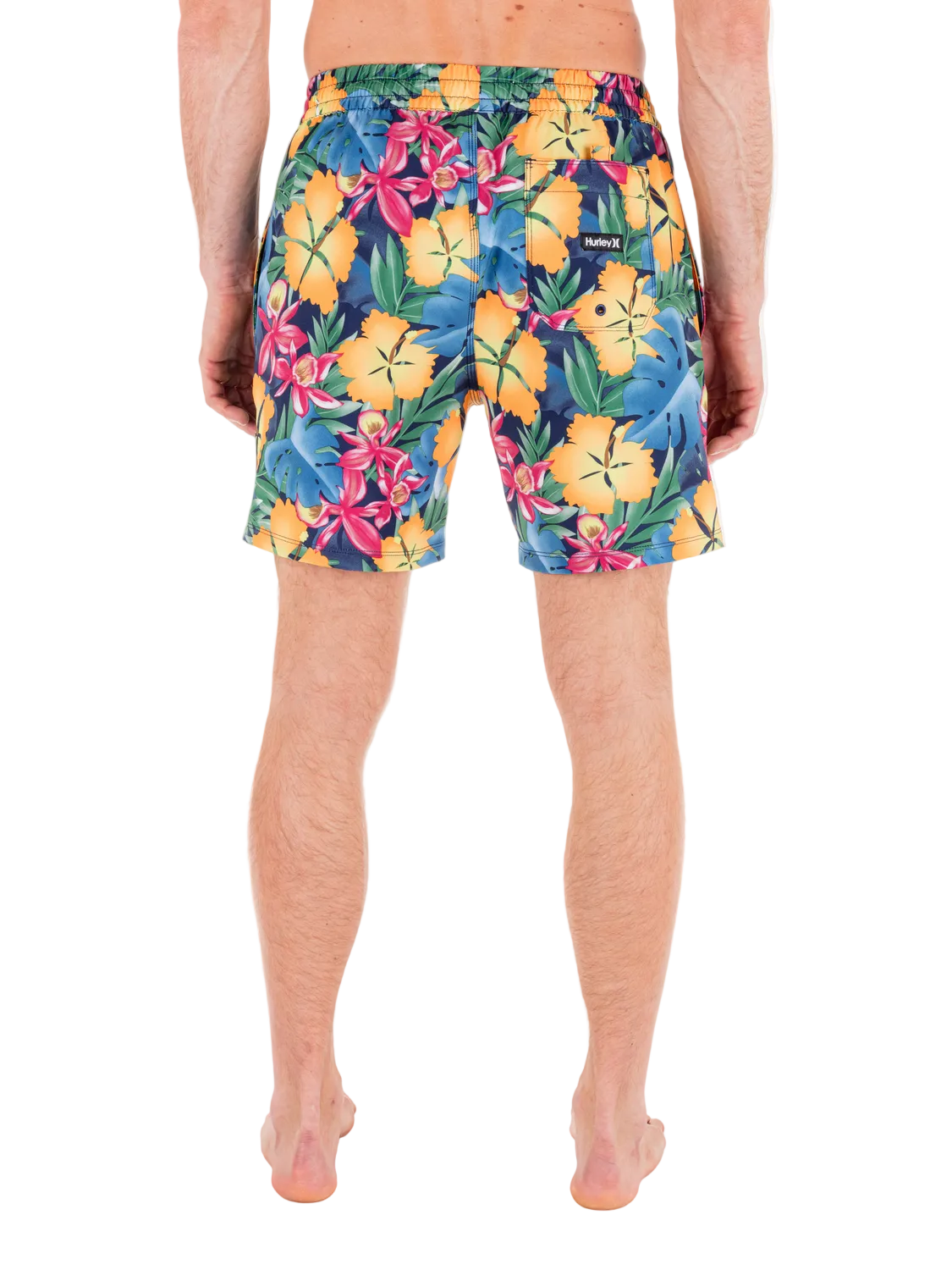 Colorful floral-patterned shorts worn by a person on a white background