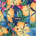 Floral-patterned shorts with a Hurley logo on a white background