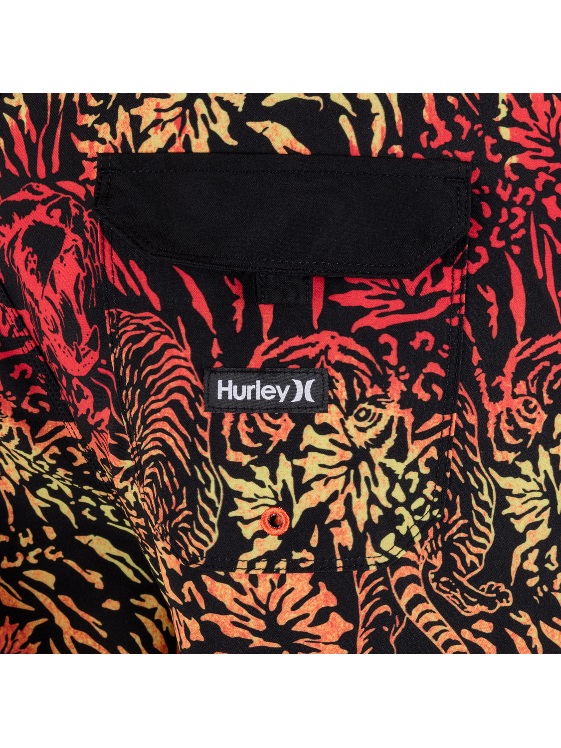 Multicolored tiger patterned fabric with a Hurley logo on a black background