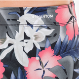Tropical floral patterned shorts with 'PHANTOM' branding on a white background