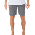 Person wearing gray shorts and a white shirt on a white background