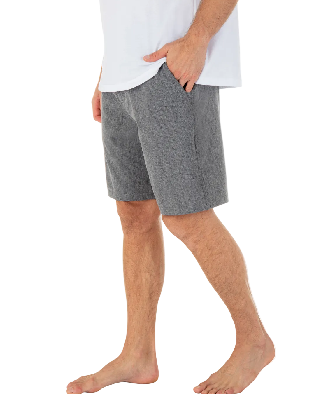 Person wearing gray shorts and a white shirt on a white background