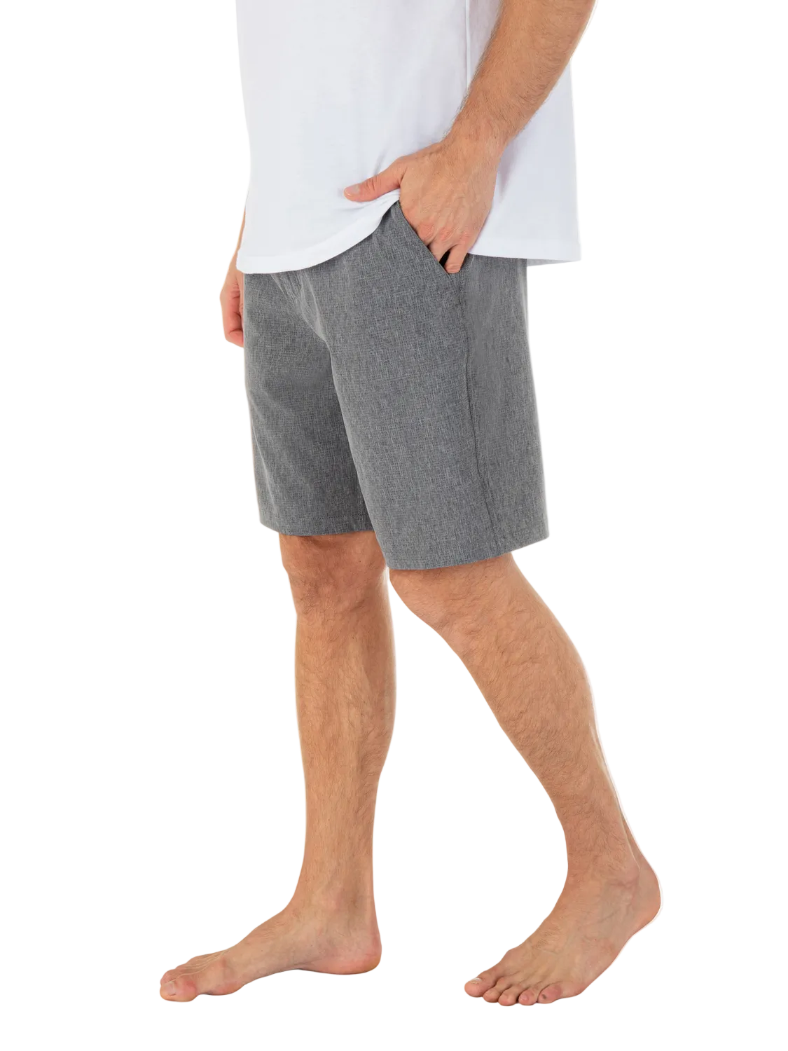Person wearing gray shorts and a white shirt on a white background