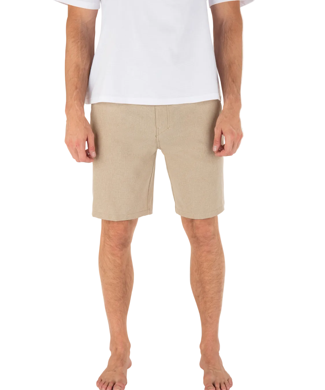 Person wearing beige shorts and a white shirt on a white background