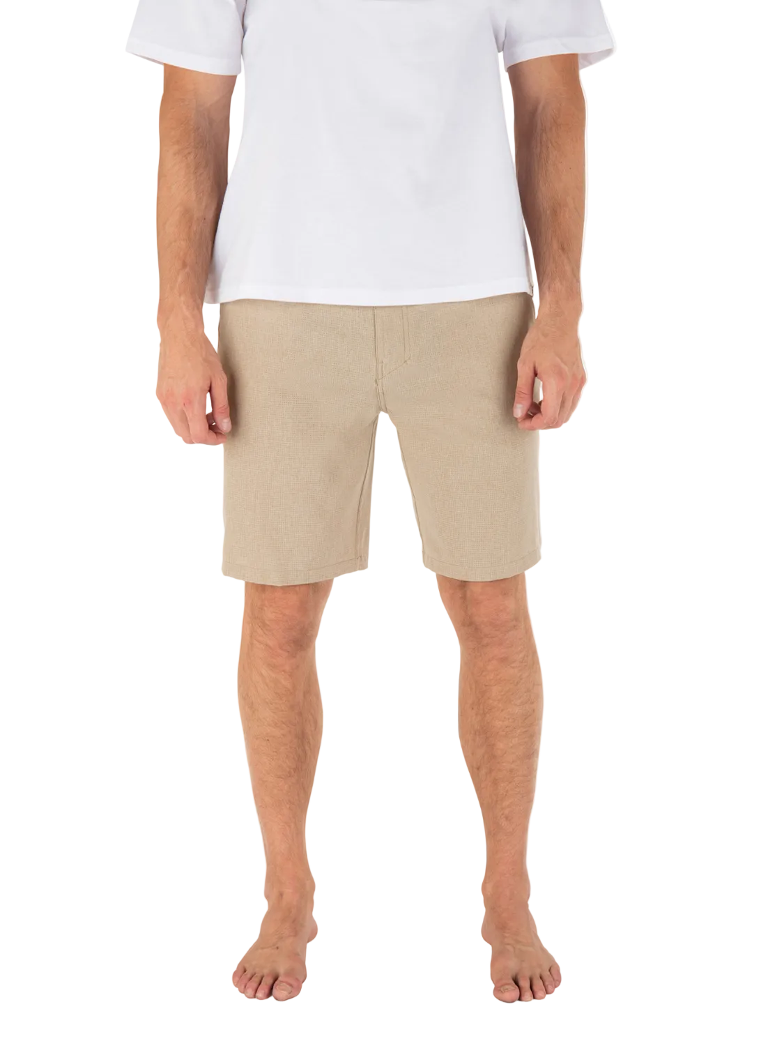 Person wearing beige shorts and a white shirt on a white background