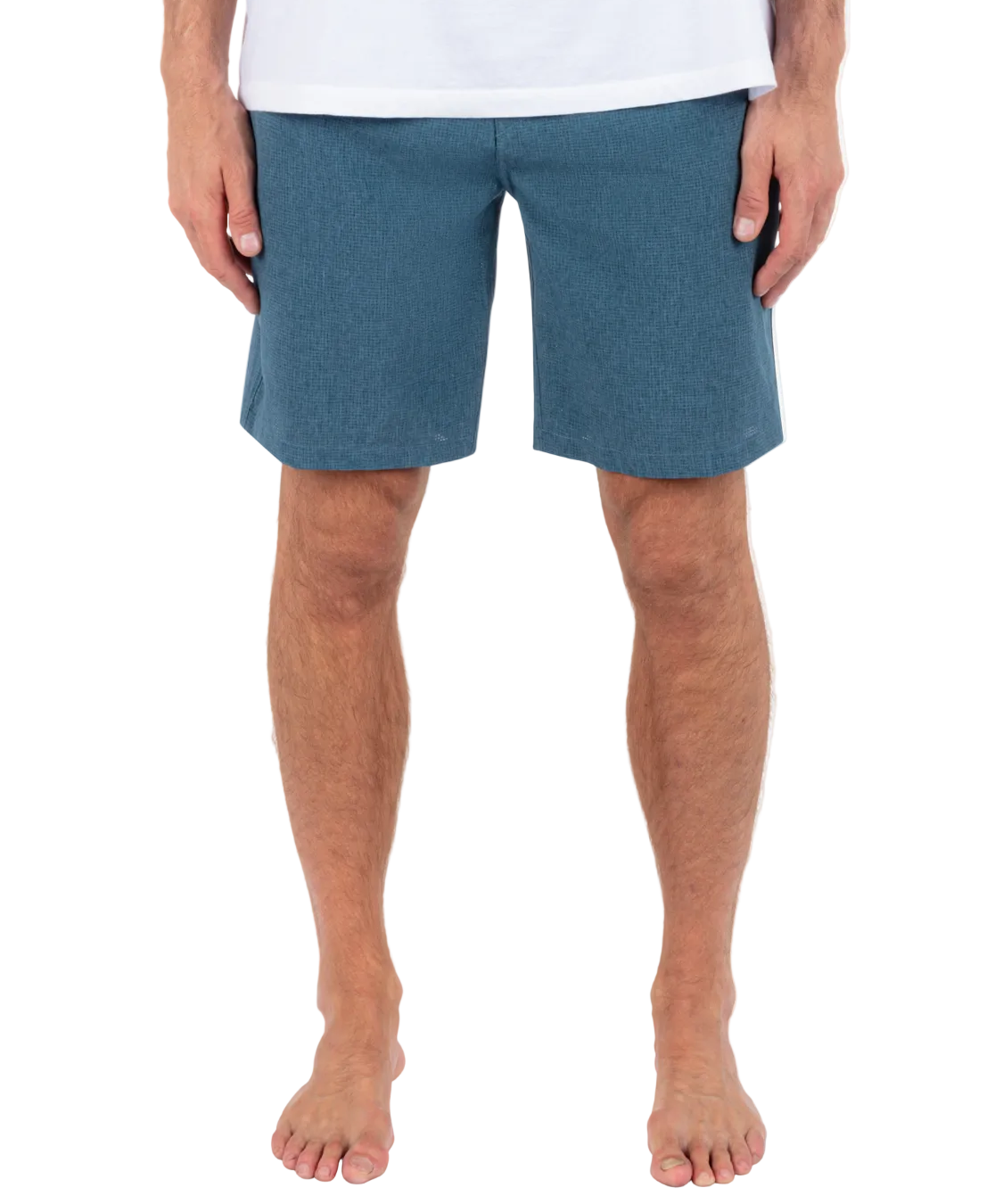 Person wearing blue shorts on a white background