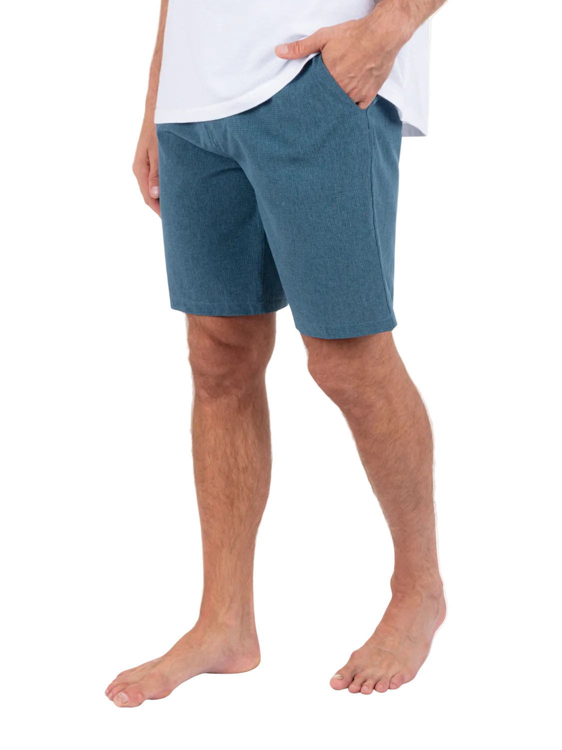 Person wearing blue shorts on a white background