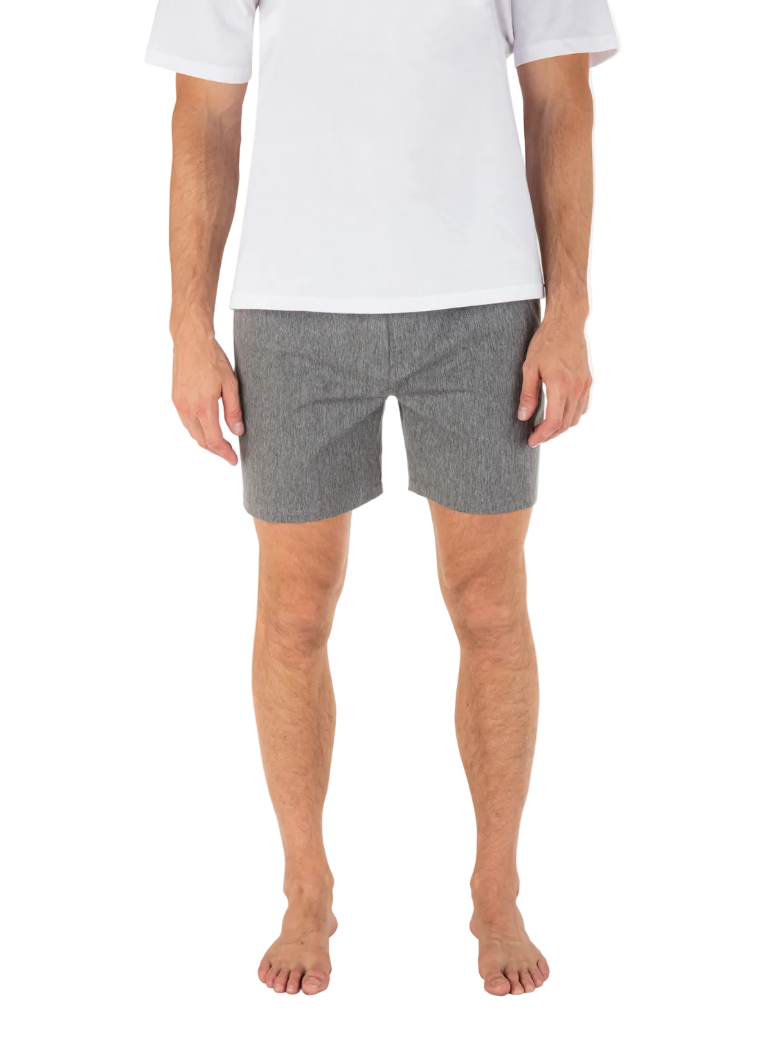 Person wearing gray shorts and a white shirt on a white background