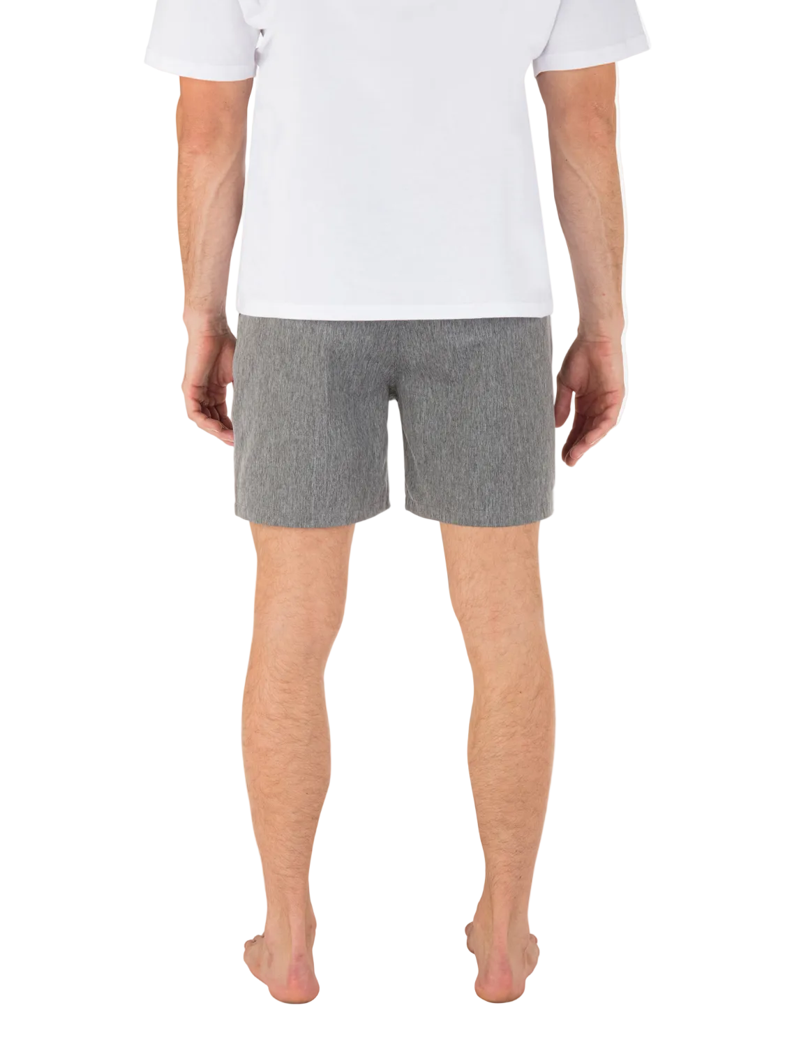 Person wearing gray shorts and a white shirt on a white background