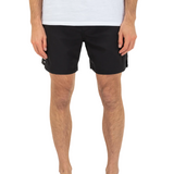 Person wearing black shorts and a white shirt on a white background