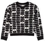 Black and white patterned sweater on a white background