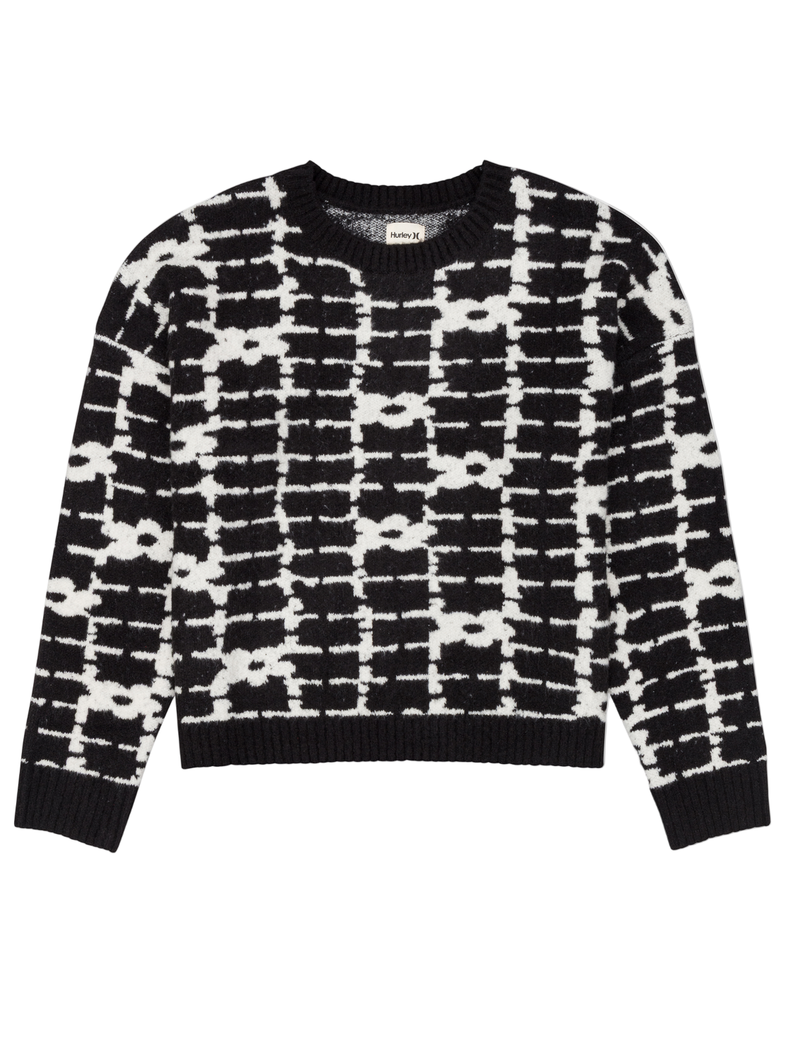 Black and white patterned sweater on a white background