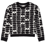 Black and white patterned sweater on a white background