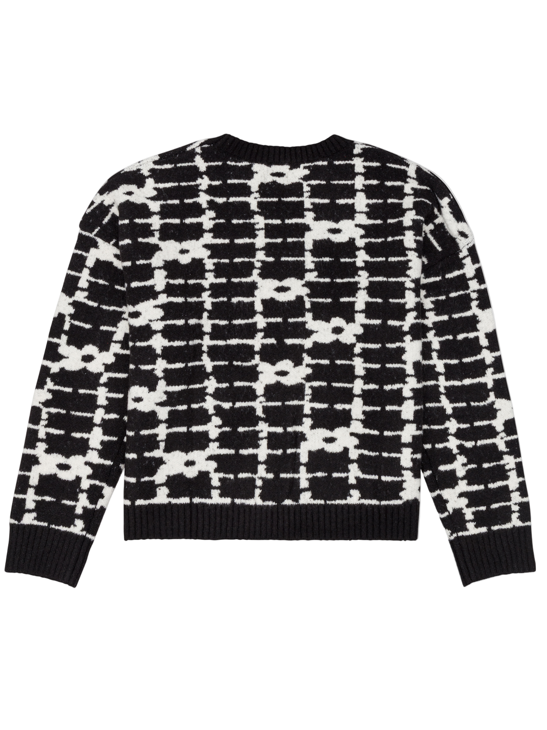 Black and white patterned sweater on a white background