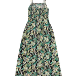 Floral dress with green and white pattern on a white background