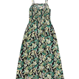 Floral dress with green and white pattern on a white background